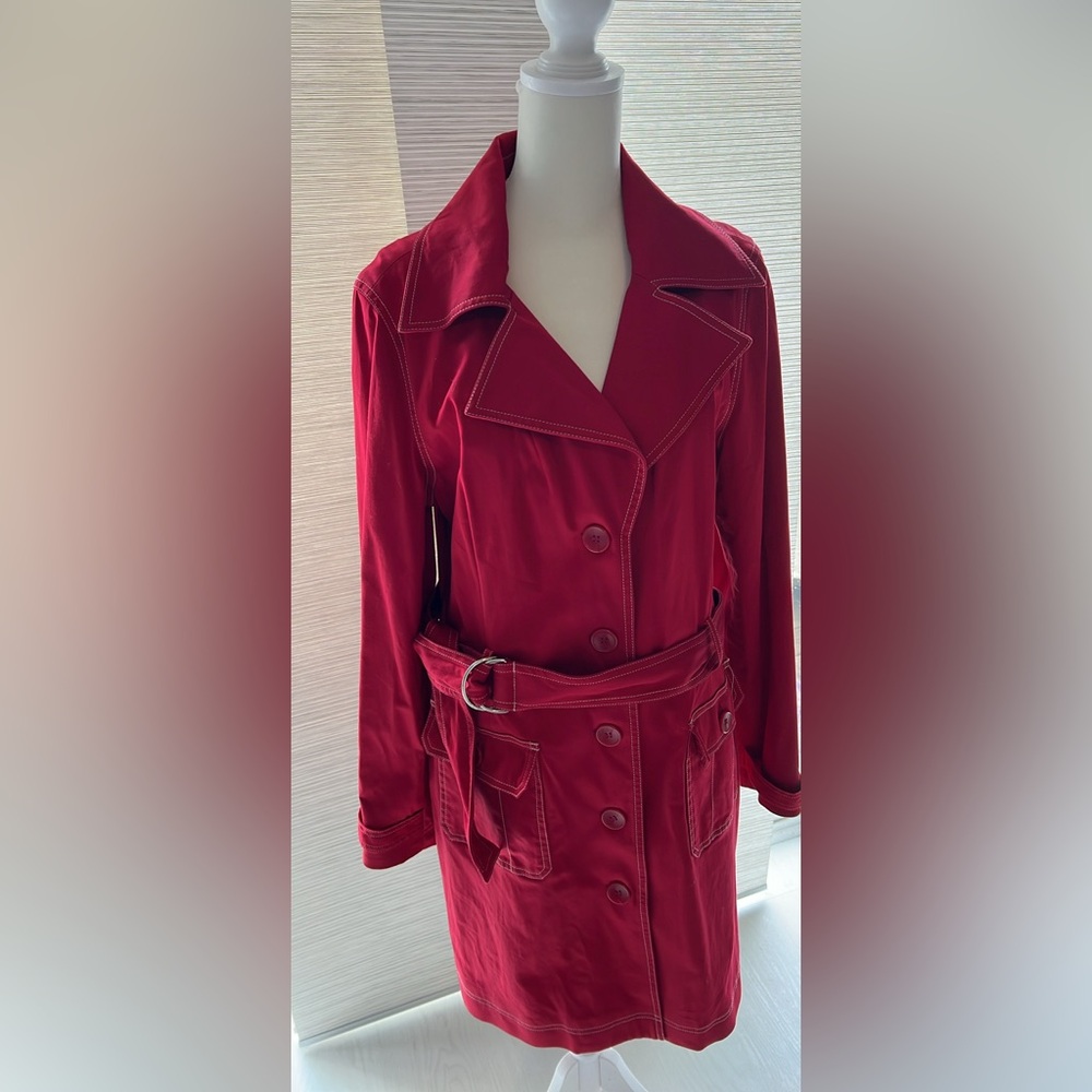 Red trench with belt.